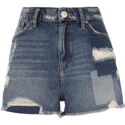 Mid blue wash distressed patch denim shorts